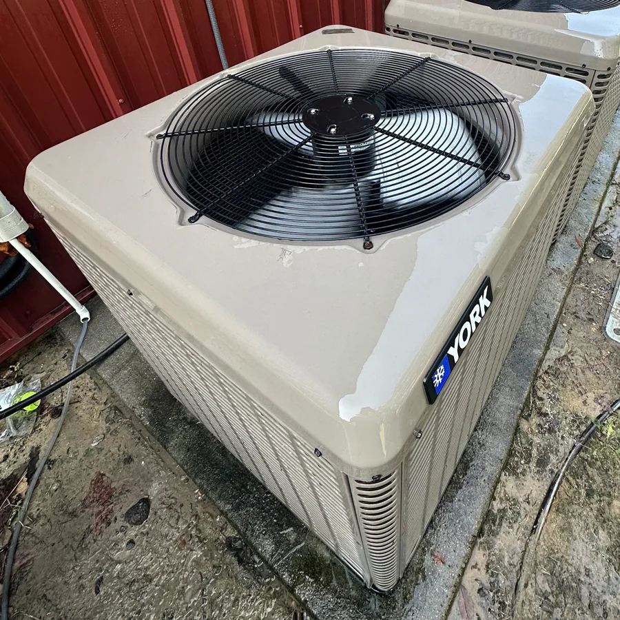 A clean HVAC outdoor condenser coil after HVAC maintenance